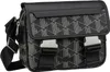 A studio shot of a black messenger bag with a geometric pattern. Anteprima dell’immagine prodotto