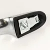 Close-up view of the internal mounting mechanism of a car door handle. Náhľad obrázku produktu