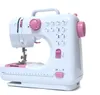 A white and pink sewing machine is shown against a white background. Náhled obrázku produktu