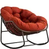 A rocking chair with a thick orange cushion. Anteprima dell’immagine prodotto