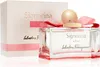 A perfume bottle and its box are displayed on a white background. Voir les images du produit