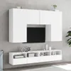 A white TV stand and wall-mounted cabinets against a gray textured wall. Podgląd zdjęcia produktu