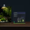 A Dennerle Plant System Set is displayed next to a planted aquarium. Produktbild-Vorschau