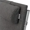 A close-up view of a gray fabric headrest cushion attached to a metal frame, with two brand tags visible. Produktbild-Vorschau