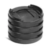 A stack of black plastic furniture risers on a white background. Podgląd zdjęcia produktu