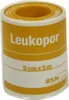 A roll of medical tape on a white background. Náhled obrázku produktu