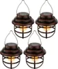 Four solar-powered lanterns arranged in a grid. Produktbild-Vorschau