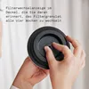 A person's hands are shown adjusting a dial on a black filter component. Náhľad obrázku produktu