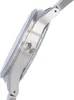 A close-up side view of a silver watch case and crown. Produktbild-Vorschau