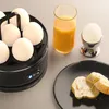 A breakfast scene featuring an egg cooker, juice, and bread. Anteprima dell’immagine prodotto