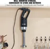 An immersion blender is mounted on a wall in a kitchen setting. Voir les images du produit