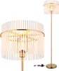 A floor lamp with a gold-colored metal base and stem, and a lampshade made of white vertical rods. Náhľad obrázku produktu