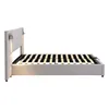 A side view of a gray upholstered bed frame with a slatted mattress support system, shown against a white background. Náhled obrázku produktu