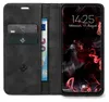 A flip case for a smartphone is shown open, revealing the phone screen and card slots with cards and currency. Produktbild-Vorschau