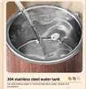 Close-up of the inside of a stainless steel water tank with water being poured in. Produktbild-Vorschau