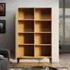 An empty wooden bookshelf with two doors open, set in a room with a window and blinds in the background. Produktbild-Vorschau