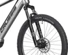 A close-up view of the front wheel and fork of a silver electric bicycle. Produktbild-Vorschau