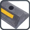 Close-up of a black parking bumper with a yellow reflective strip and a circular indentation. Produktbild-Vorschau