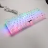 A transparent RGB gaming keyboard with a white cable is displayed on a white surface. Produktbild-Vorschau