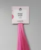 A swatch of pink hair dye attached to a product tag. Produktbild-Vorschau