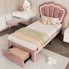A bedroom scene with a pink bed, vanity, and chair. Produktbild-Vorschau