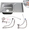 A stainless steel kitchen sink with drainer and plumbing accessories, presented on a white background. Anteprima dell’immagine prodotto