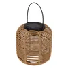 A solar lantern with a rattan-like woven exterior and a black top with a solar panel. Anteprima dell’immagine prodotto