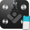 A black smart scale with a digital display and a smartphone showing health data. Produktbild-Vorschau