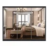 A bedroom scene reflected in a wardrobe. Produktbild-Vorschau