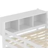 A close-up view of the top section of a white bunk bed, showing a shelf unit with three compartments above the bed frame. Produktbild-Vorschau