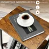 A close-up view of a wooden side table with a book and a cup of coffee on it, with feature highlights in the background. Náhľad obrázku produktu
