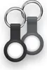 Two AirTag holders, one gray and one black, are shown against a white background. Produktbild-Vorschau