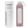 A glass water bottle with a silicone sleeve and its packaging tube. Náhľad obrázku produktu