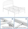 A white metal bed frame shown from a slightly elevated, angled perspective, with two inset detail images demonstrating assembly steps. Produktbild-Vorschau