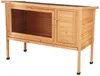 A wooden hutch for small animals, raised on legs, with a mesh front and a solid door. Voir les images du produit