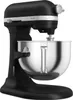 A black KitchenAid Artisan stand mixer with a silver bowl is shown from a side-angle. Produktbild-Vorschau
