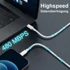 A white USB-C cable connecting a laptop to a smartphone, illustrating high-speed data transfer. Produktbild-Vorschau