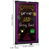 A black LED writing board with colorful drawings and text, illuminated by purple LEDs around the edge. Dimensions are shown with measurement lines and text. Náhľad obrázku produktu
