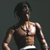A close-up shot of a male figure, appearing to be a doll or action figure, with dreadlocks and a gold chain. Anteprima dell’immagine prodotto