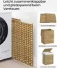 A laundry basket shown folded and unfolded next to a washing machine. Produktbild-Vorschau