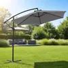 A garden scene with a cantilever umbrella, patio furniture, and lush greenery. Produktbild-Vorschau