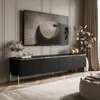 A modern living room with a TV cabinet and a large television mounted on the wall. Produktbild-Vorschau
