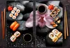 A collage of sushi and a flower on wet black stones. Náhled obrázku produktu