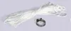 A white rope and a metal clamp are laid out on a white background. Podgląd zdjęcia produktu