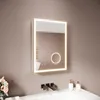 A lit bathroom mirror with a circular magnifying mirror and a sink below. Náhled obrázku produktu