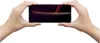 Two hands holding a smartphone horizontally. Produktbild-Vorschau