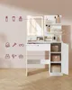 A white vanity table with a mirror and storage compartments, displayed against a pinkish background. Produktbild-Vorschau