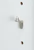 A close-up shot of a shelf support peg on a white surface with two pre-drilled holes. Produktbild-Vorschau