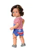 A doll standing against a white background. Produktbild-Vorschau
