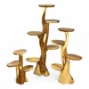 Three wooden plant stands of varying heights, designed to resemble tree branches with multiple shelves. Voir les images du produit